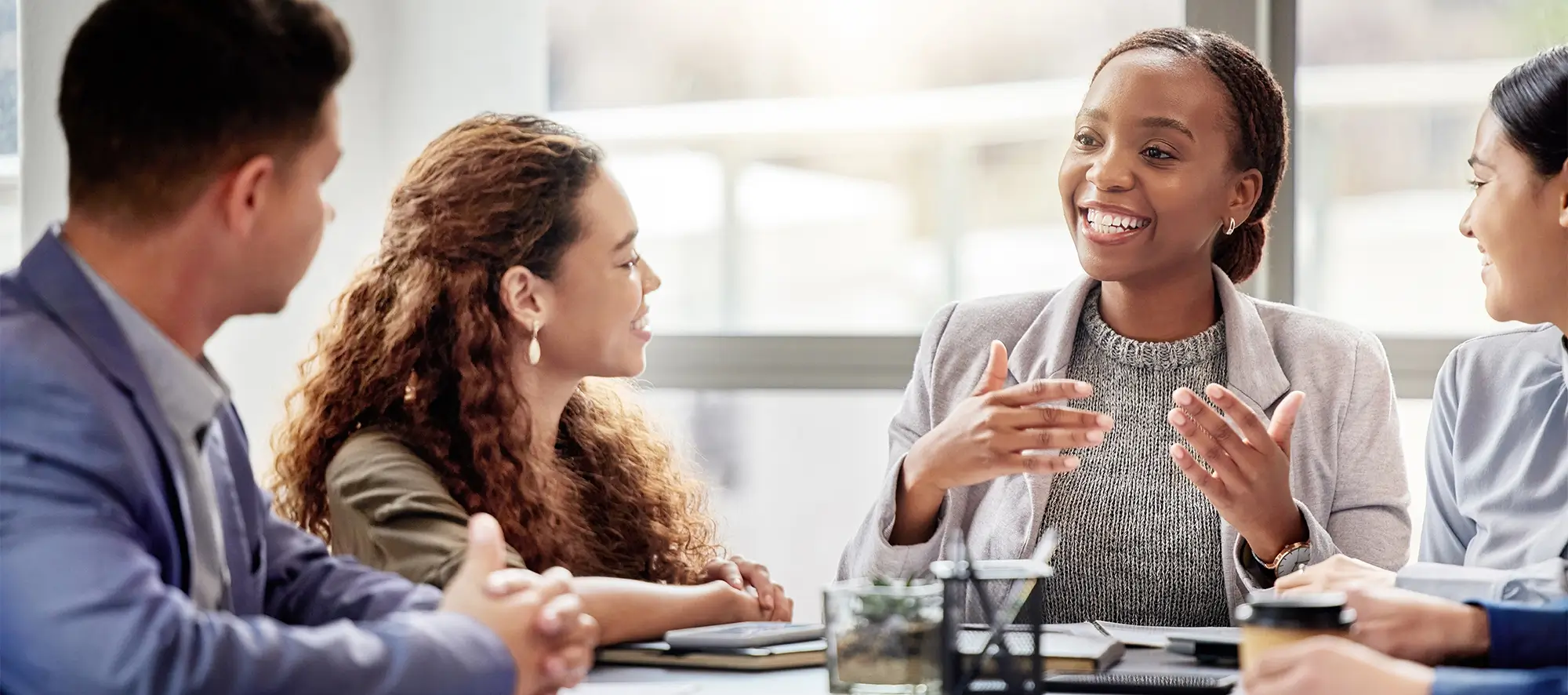 Business people talking at table.