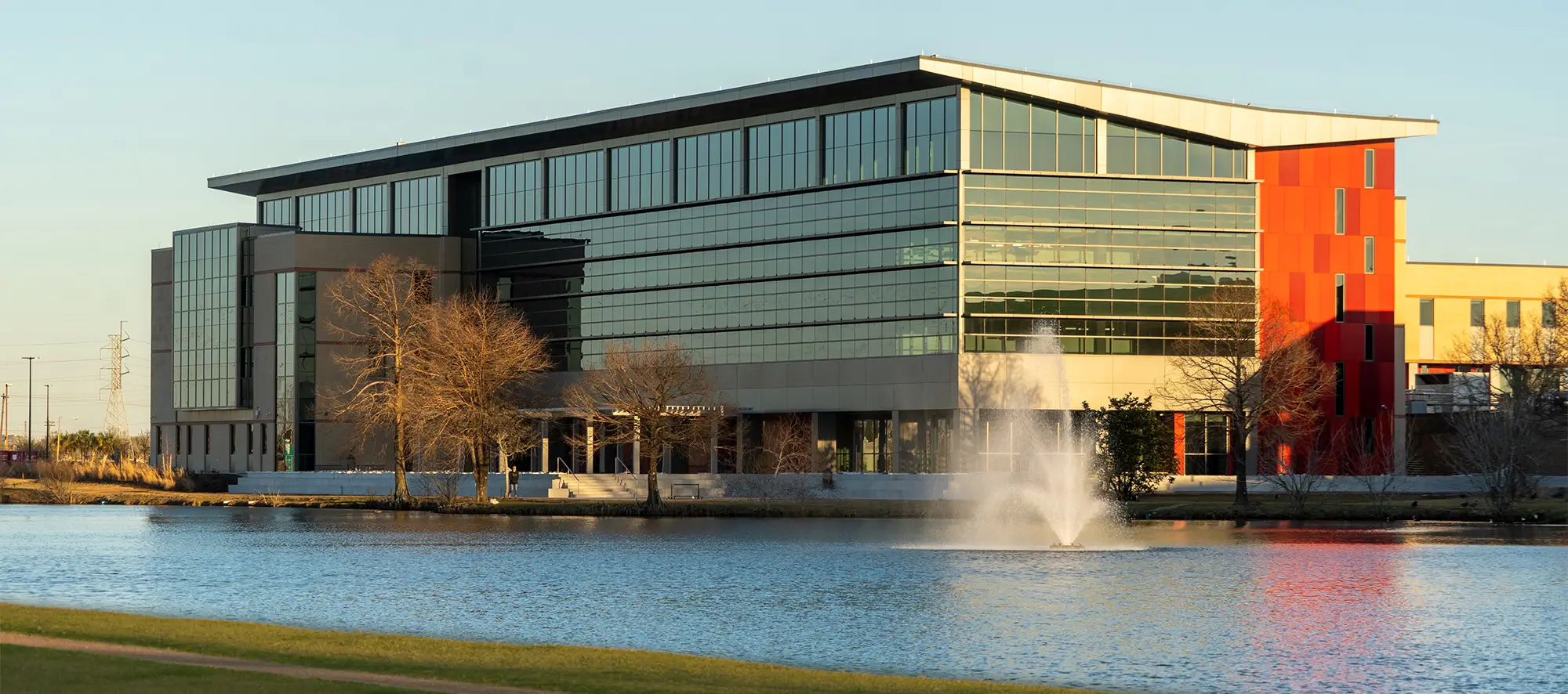 College of the Mainland STEAM building and lake. 
