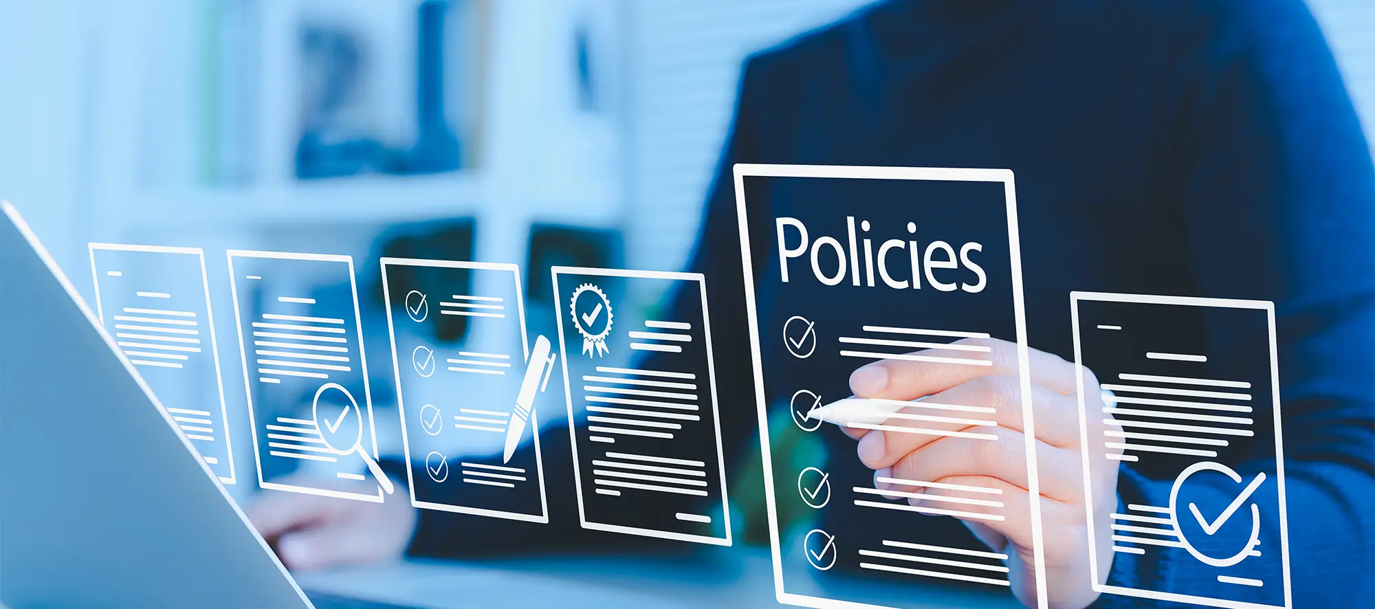 Person on computer looking at policies.