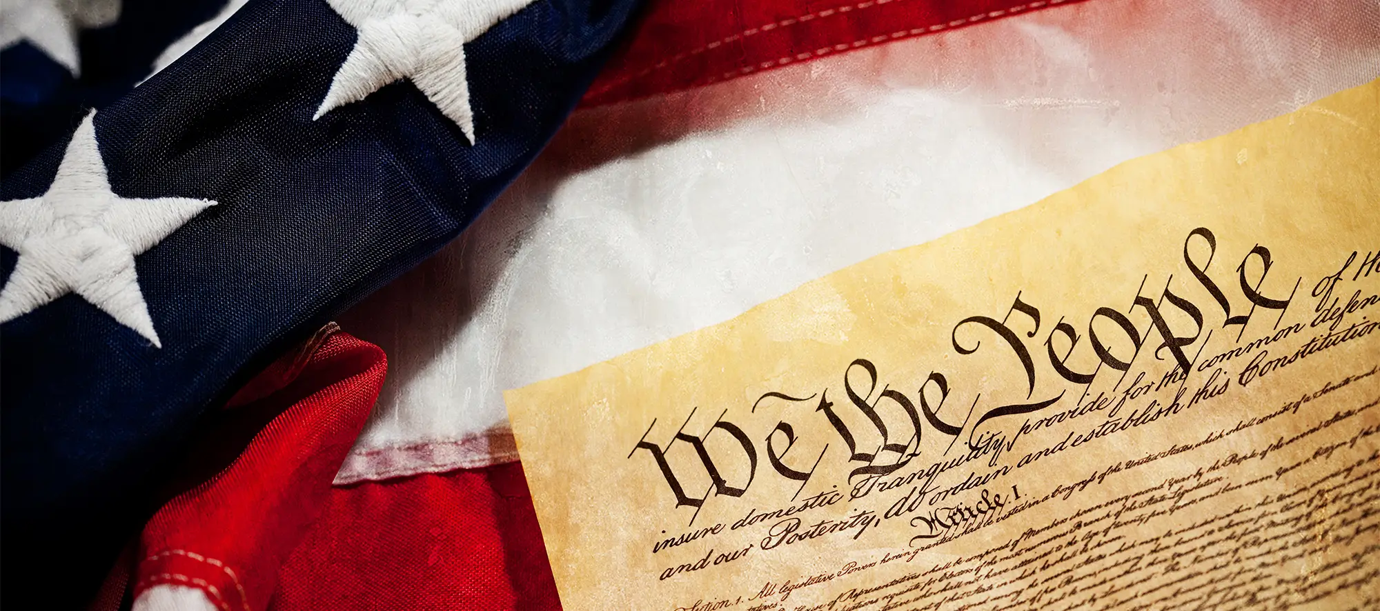 The united state constitution on the american flag.