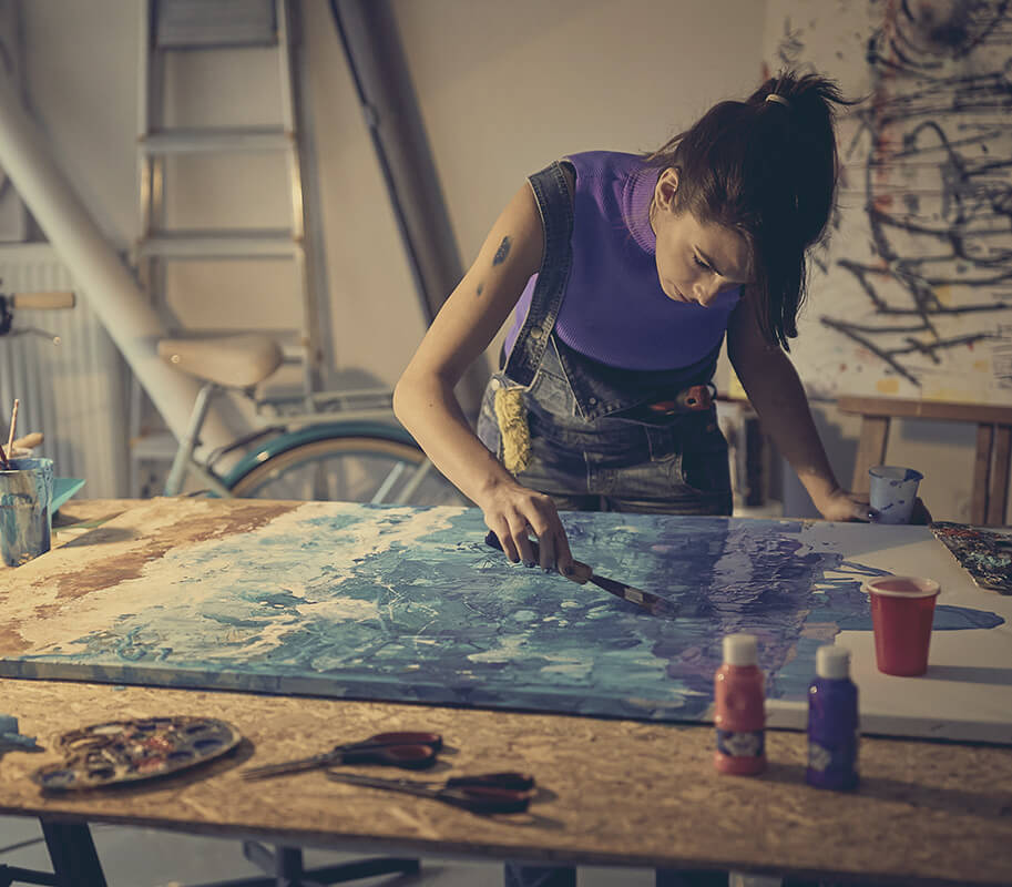 Girl painting in an art studio