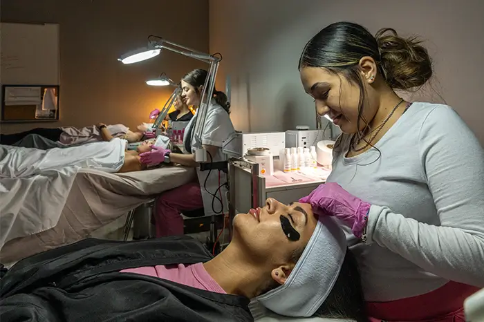 Woman getting a spa treatment at the salon at com.