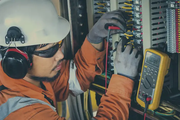 Technician working on an electrical system