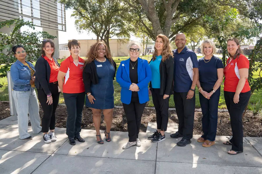 Collegiate High School staff photo outside
