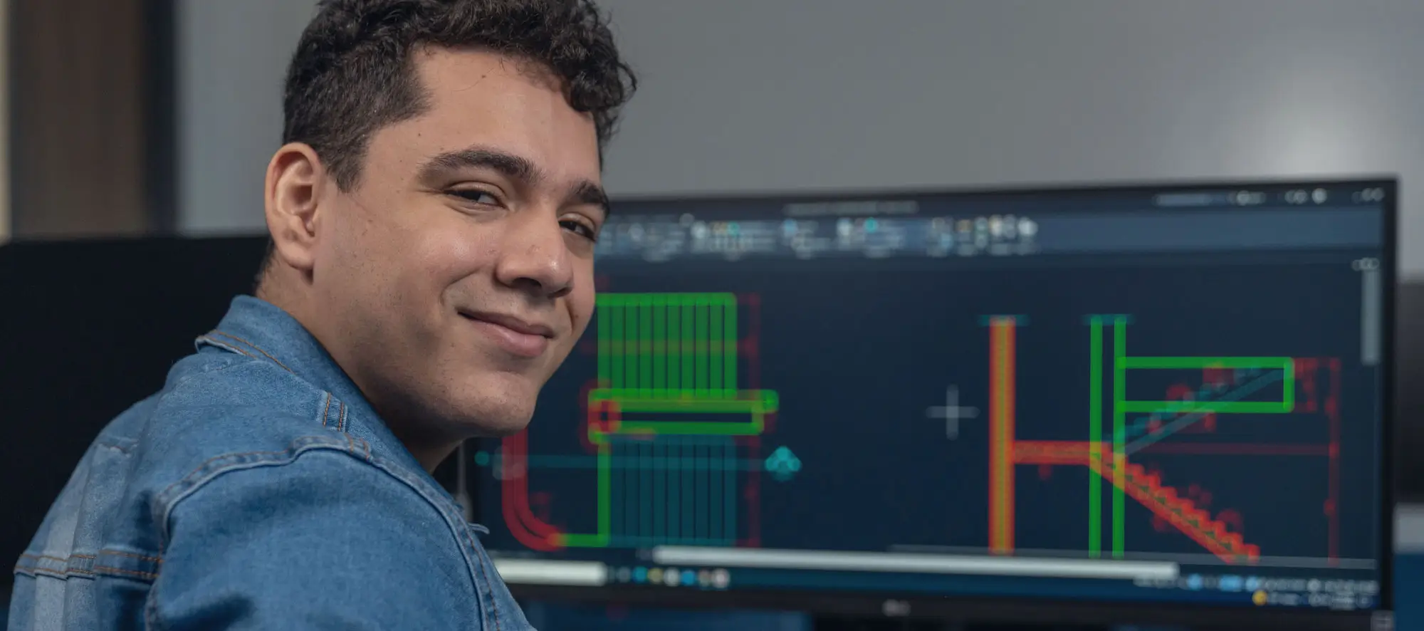 Student in computer lab with drafting computer.