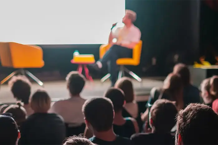 People listening to a presentation.