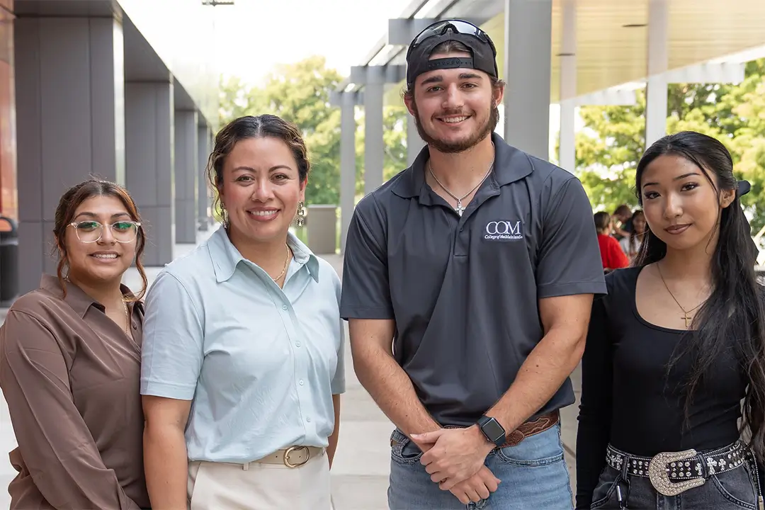 COM President Dr. Helen Brewer with students Aliza Cevallos, Kallen Cram and Abrielle Serona during the Lunch with the President event.