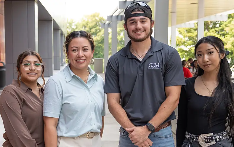 COM President Dr. Helen Brewer with students Aliza Cevallos, Kallen Cram and Abrielle Serona during the Lunch with the President event.