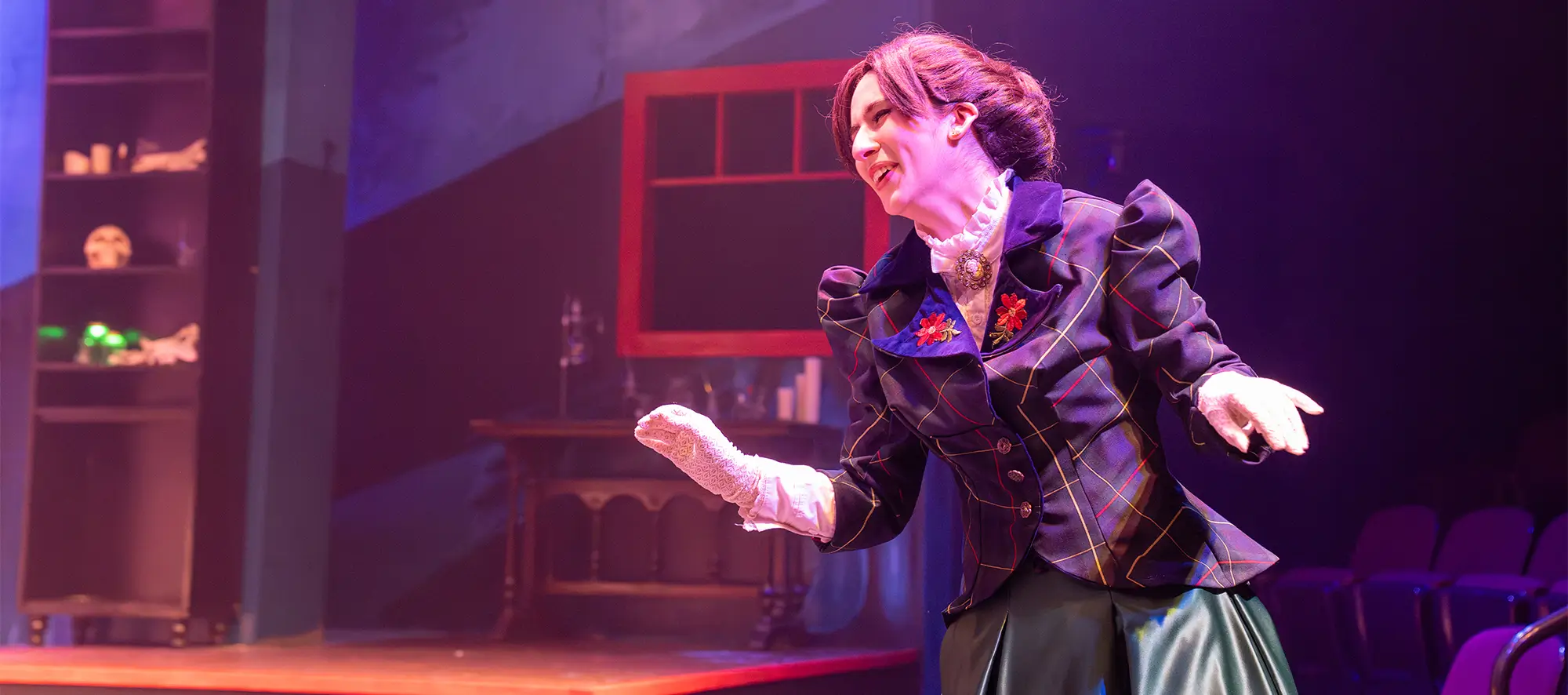 Theatre actress on stage at College of the Mainland's theatre.