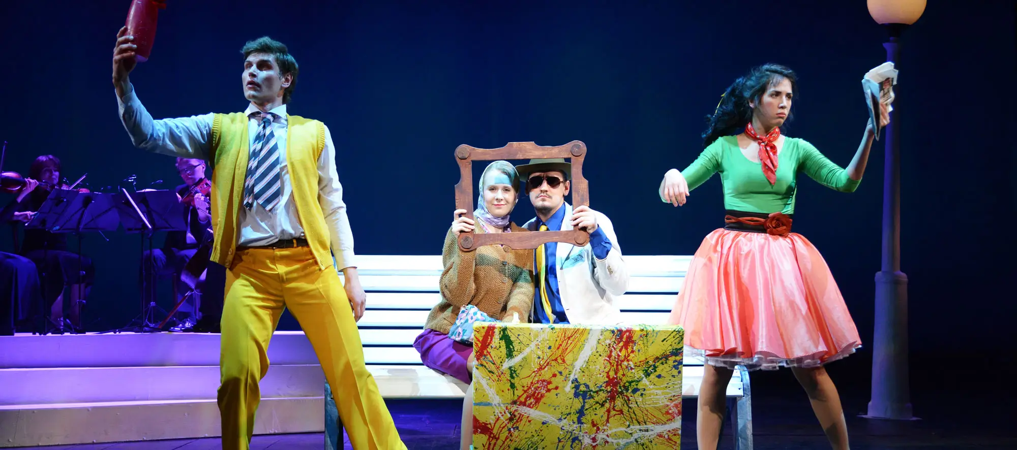 Young actors and Actresses dance on the stage of the theater