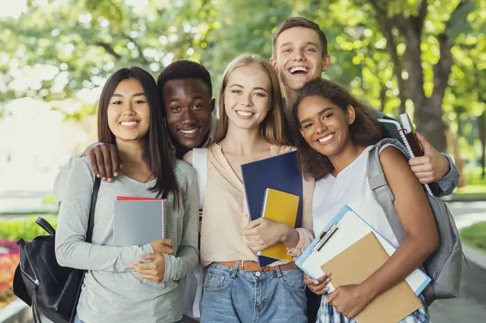 Group of international students having fun after studying.