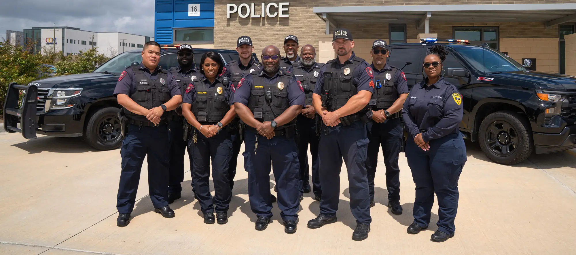 Campus Police officers standing outside station
