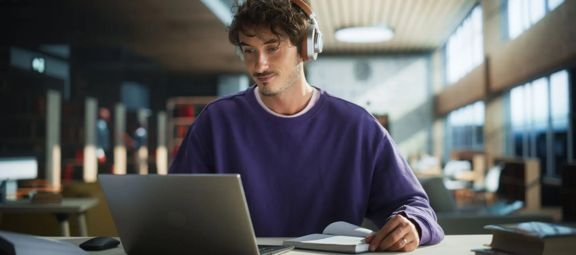 Student taking training on Laptop Computer