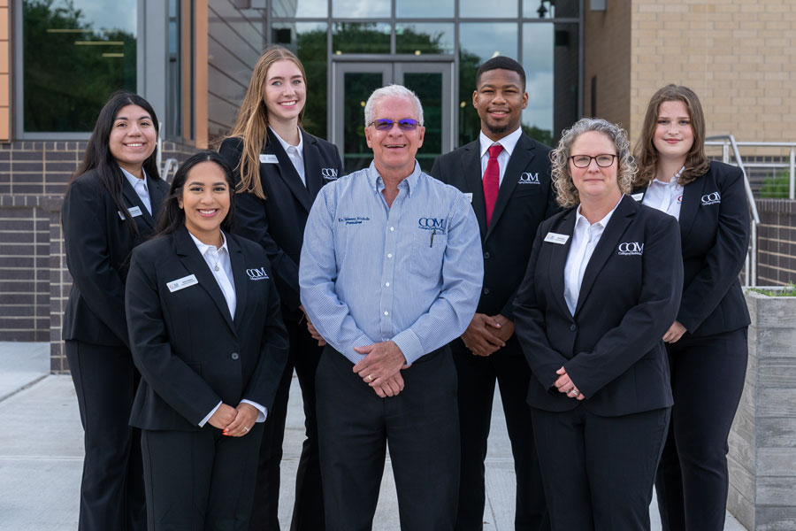 College President with the 2021-2022 Ambassadors.