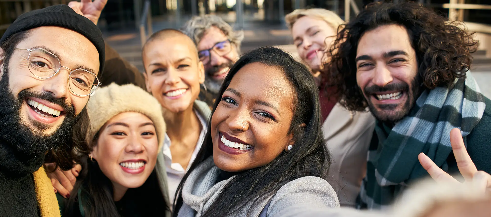 Group of diverse people taking a selfie.
