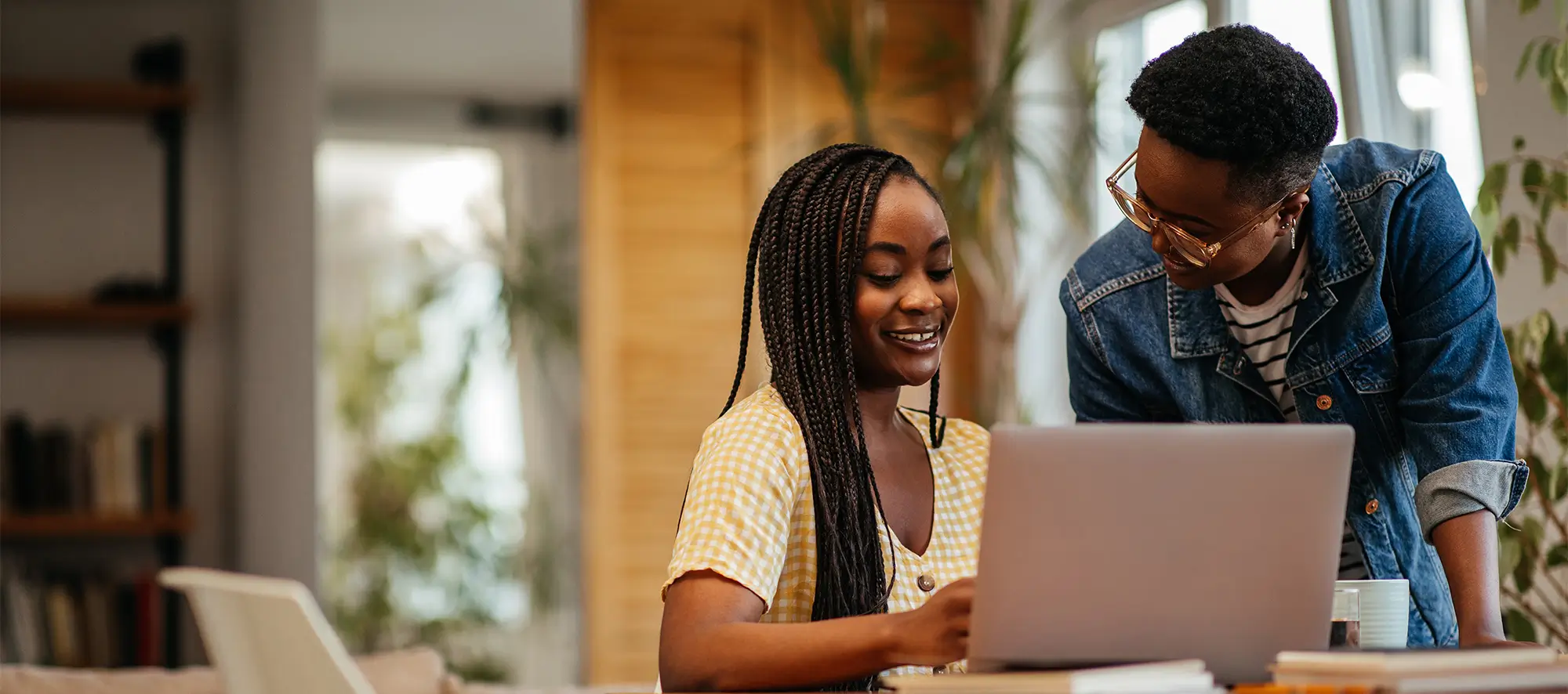 Student getting help at a computer