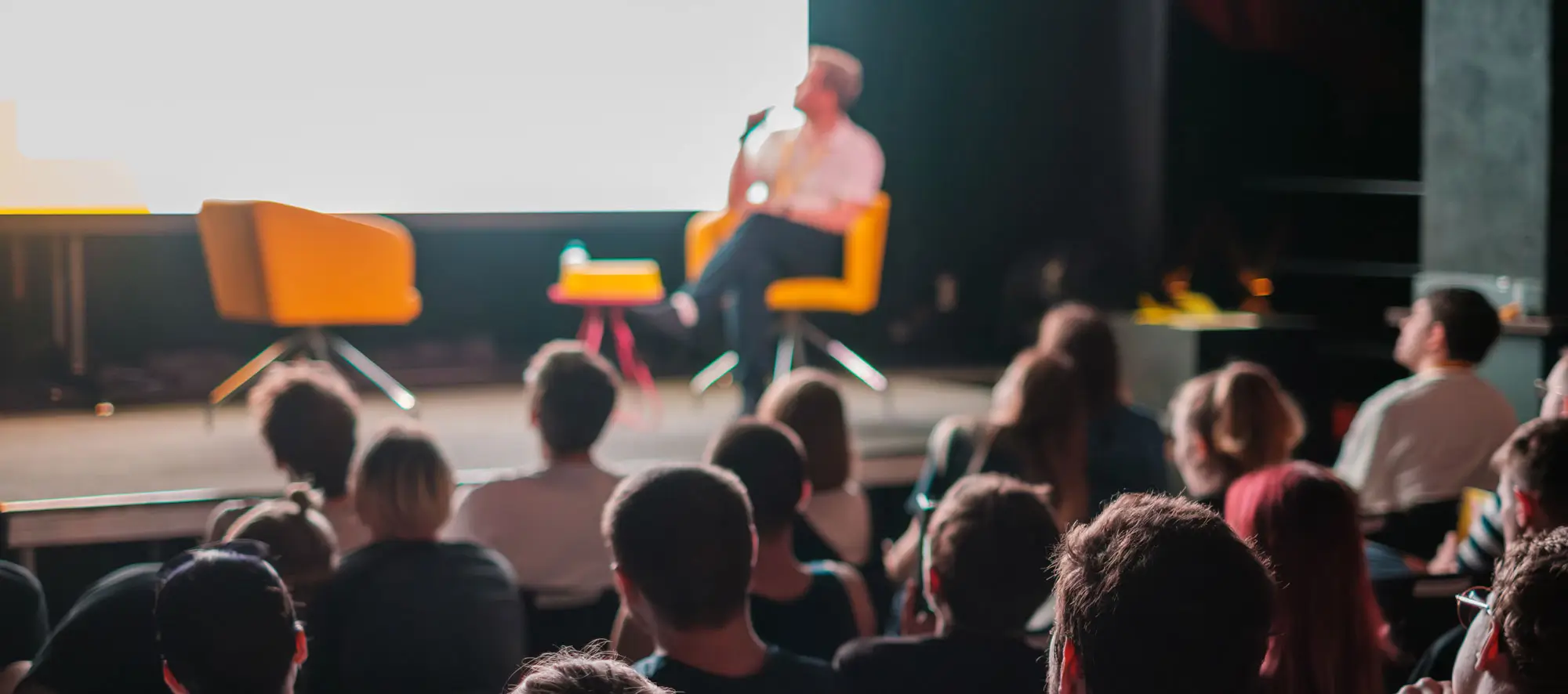 People listening to a presentation.