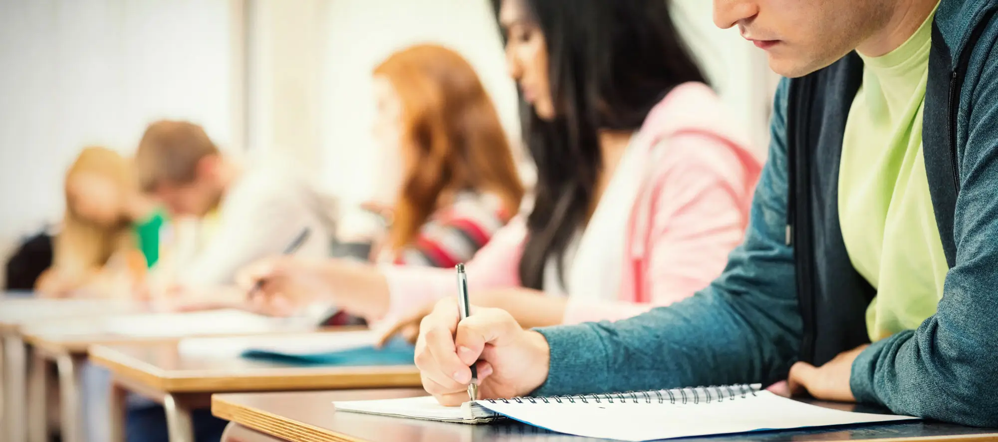Students in classroom taking an exam