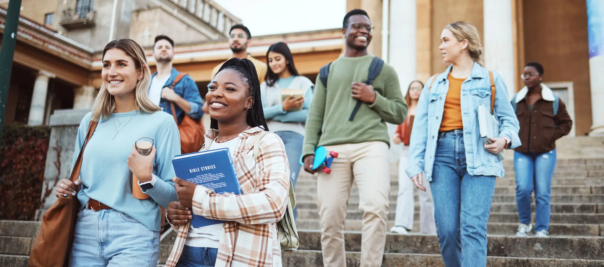 Students walking down university steps
